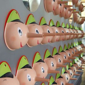 A fact checker hangs up his Pinocchios