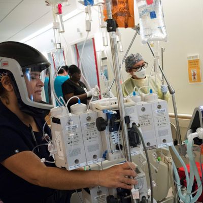 'Battlefield Medicine' In Los Angeles ICU As Biden Launches 'Wartime Effort'